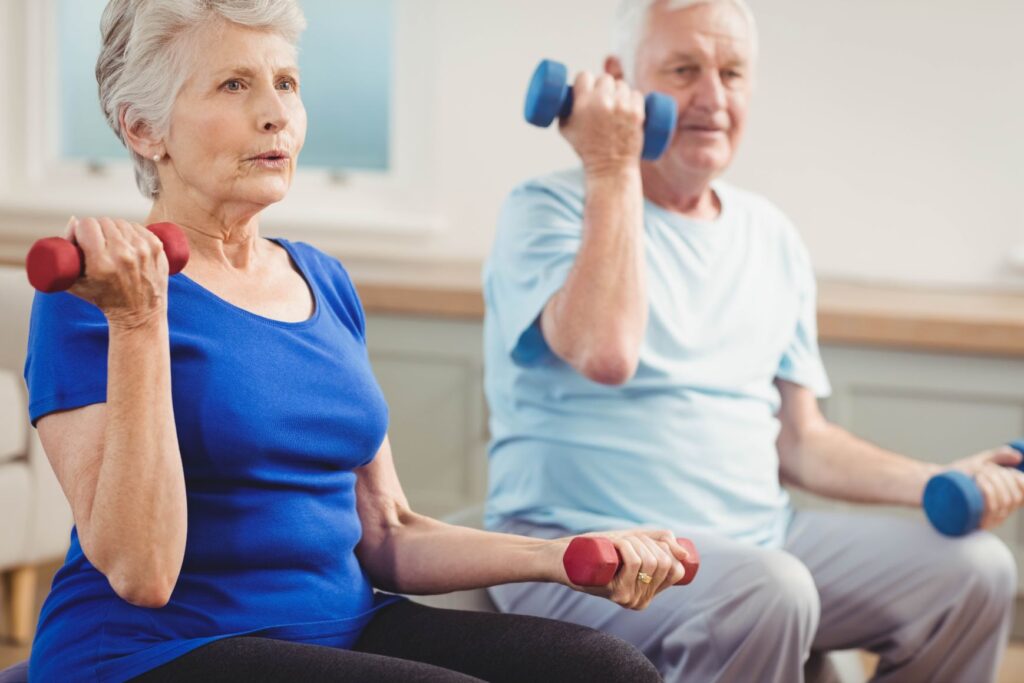 A man and a woman exercising.